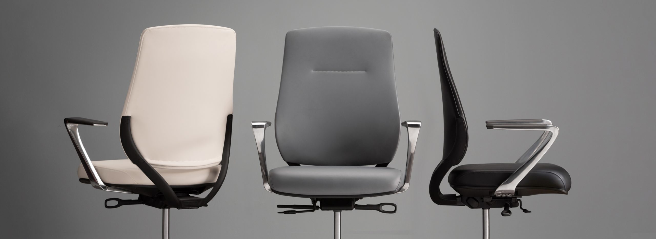 AIS Office Chairs against grey background